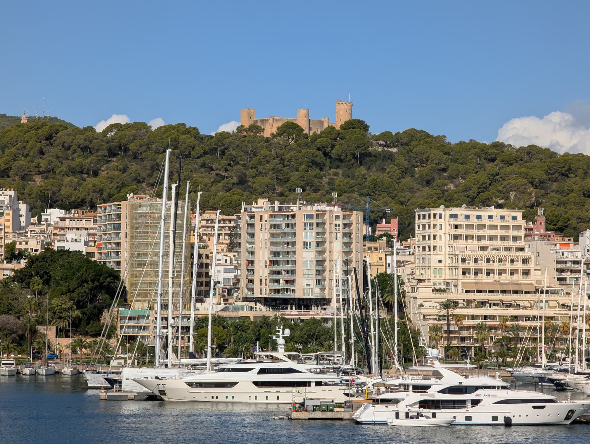 Motor yachts in Palma harbour below Bellver Castle